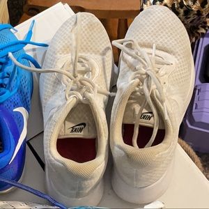Size 9. White nike athletic shoes. Worn